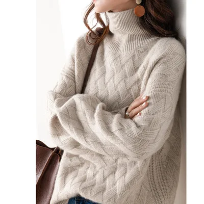 Thick gauge cashmere turtleneck showing substantial knit structure and warmth properties
