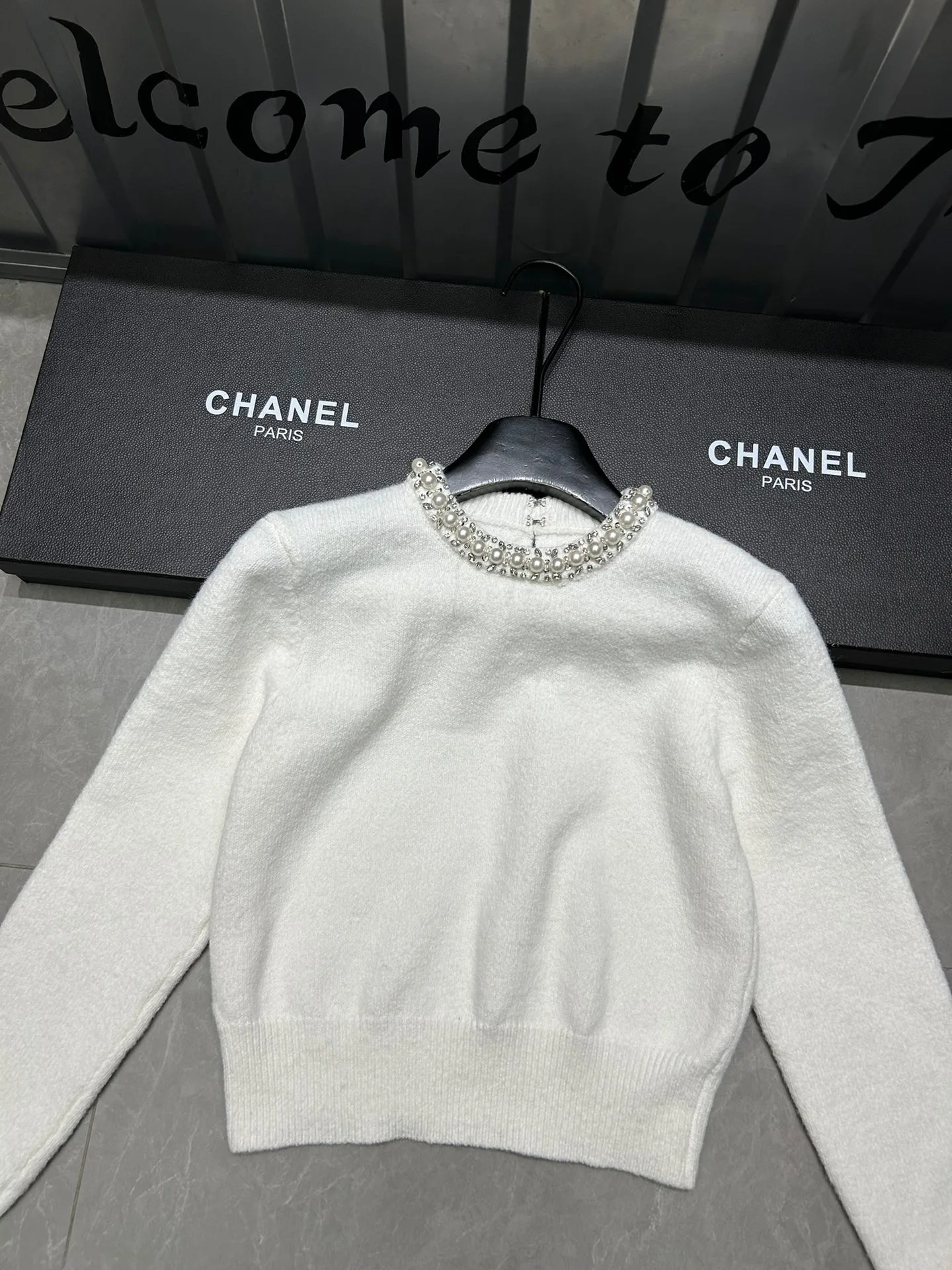 Elegant cashmere piece requiring proper care for transitional wear