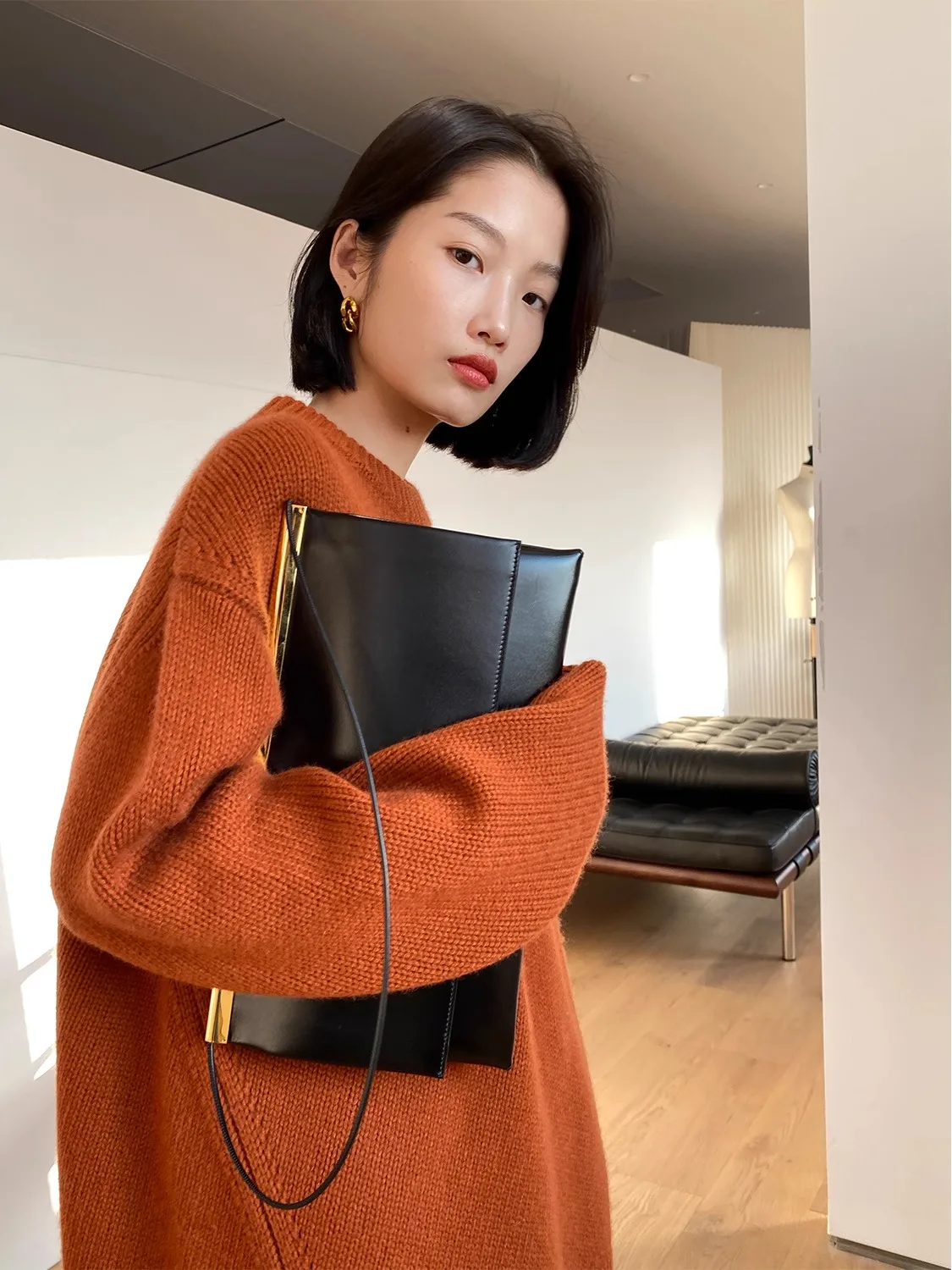 Women's luxury oversized crew neck cashmere sweater styled for casual elegance