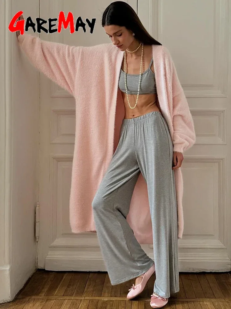 Oversized chunky knit cardigan showing styling possibilities