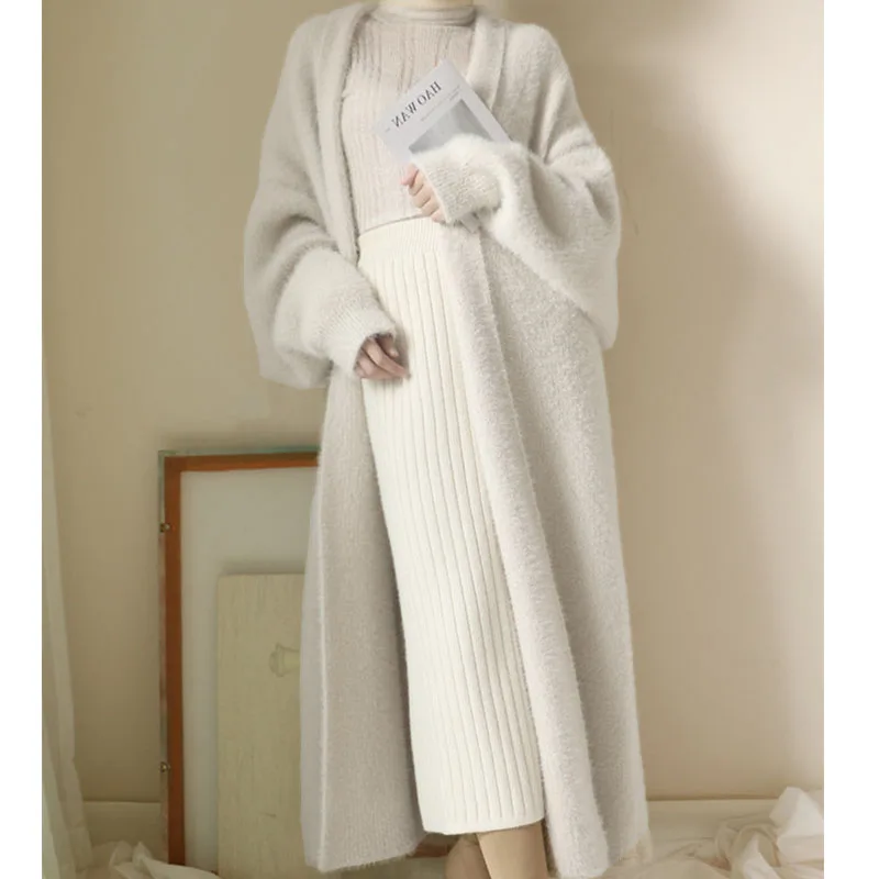 Stylish lightweight cashmere cardigan layered over casual outfit